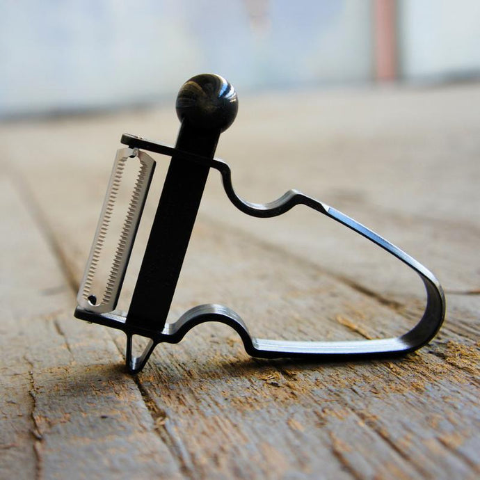 Small Black Peeler